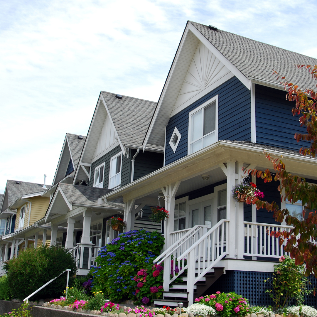 Southern Ontario residential home exterior during summer — seasonal exterior maintenance checklist for Kitchener-Waterloo homeowners